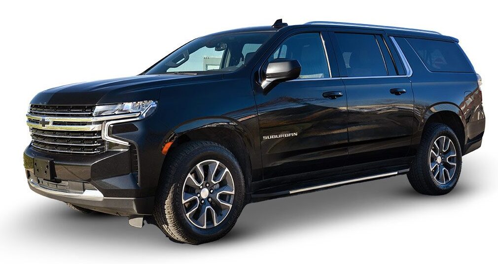05-VUS-limo-jpg Black SUV parked on a white background.