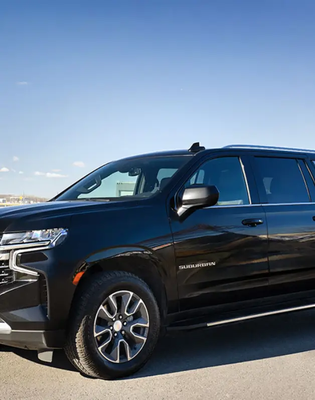 Black SUV parked on a sunny day.